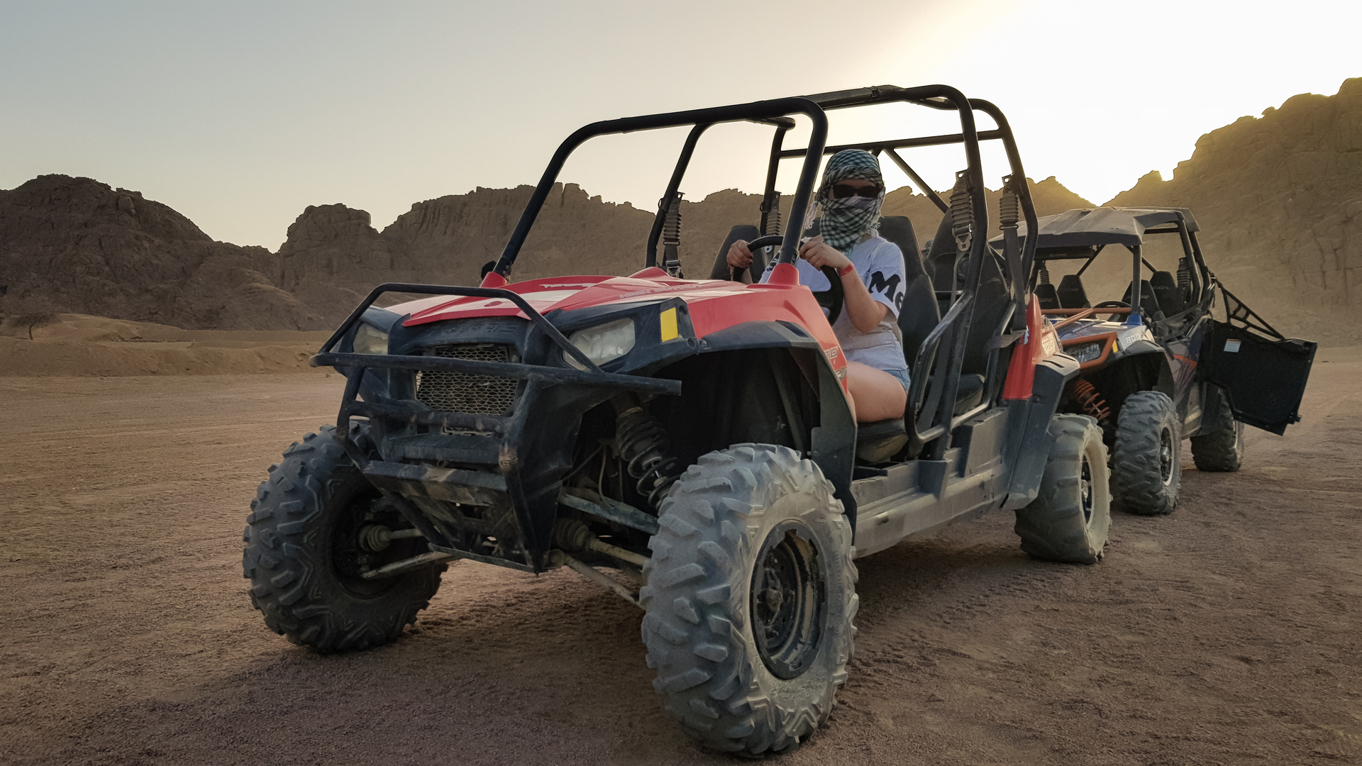 Morning desert safari in Hurghada with family-friendly quad biking, dune buggy ride, camel experience, and Bedouin village visit